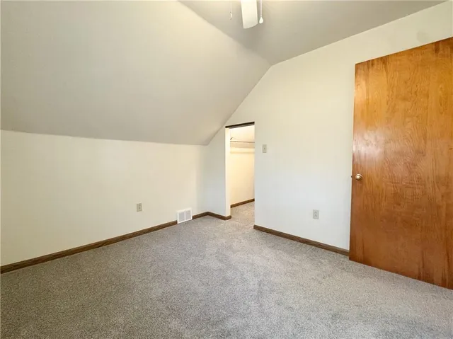a kitchen with stainless steel appliances granite countertop a stove and a microwave