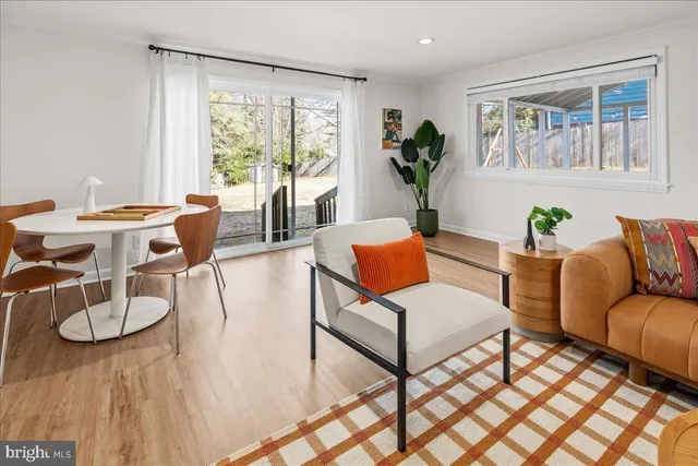 a bedroom with a bed and a table in it