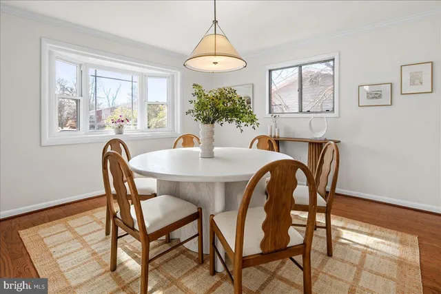 a kitchen with stainless steel appliances granite countertop a stove top oven a sink dishwasher and a refrigerator