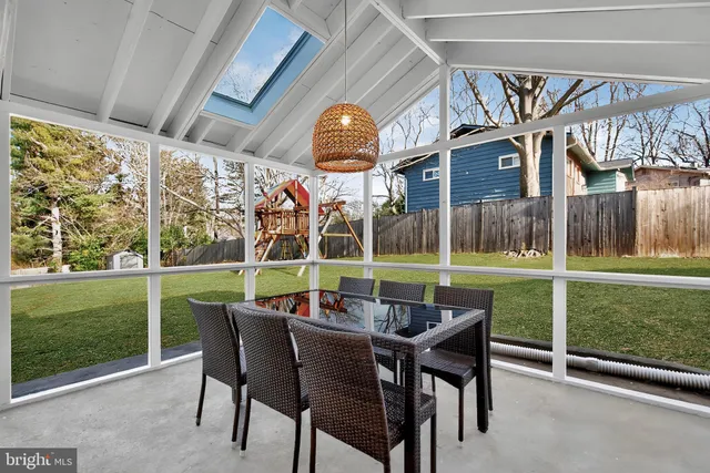 a view of a chairs and table in the patio