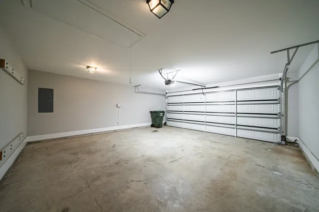 a view of an empty room with white walls