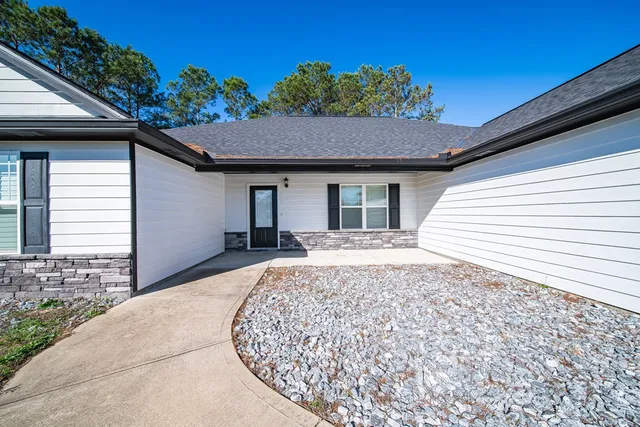 a house view with a outdoor space
