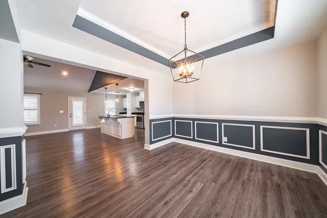 a view of a livingroom with a furniture