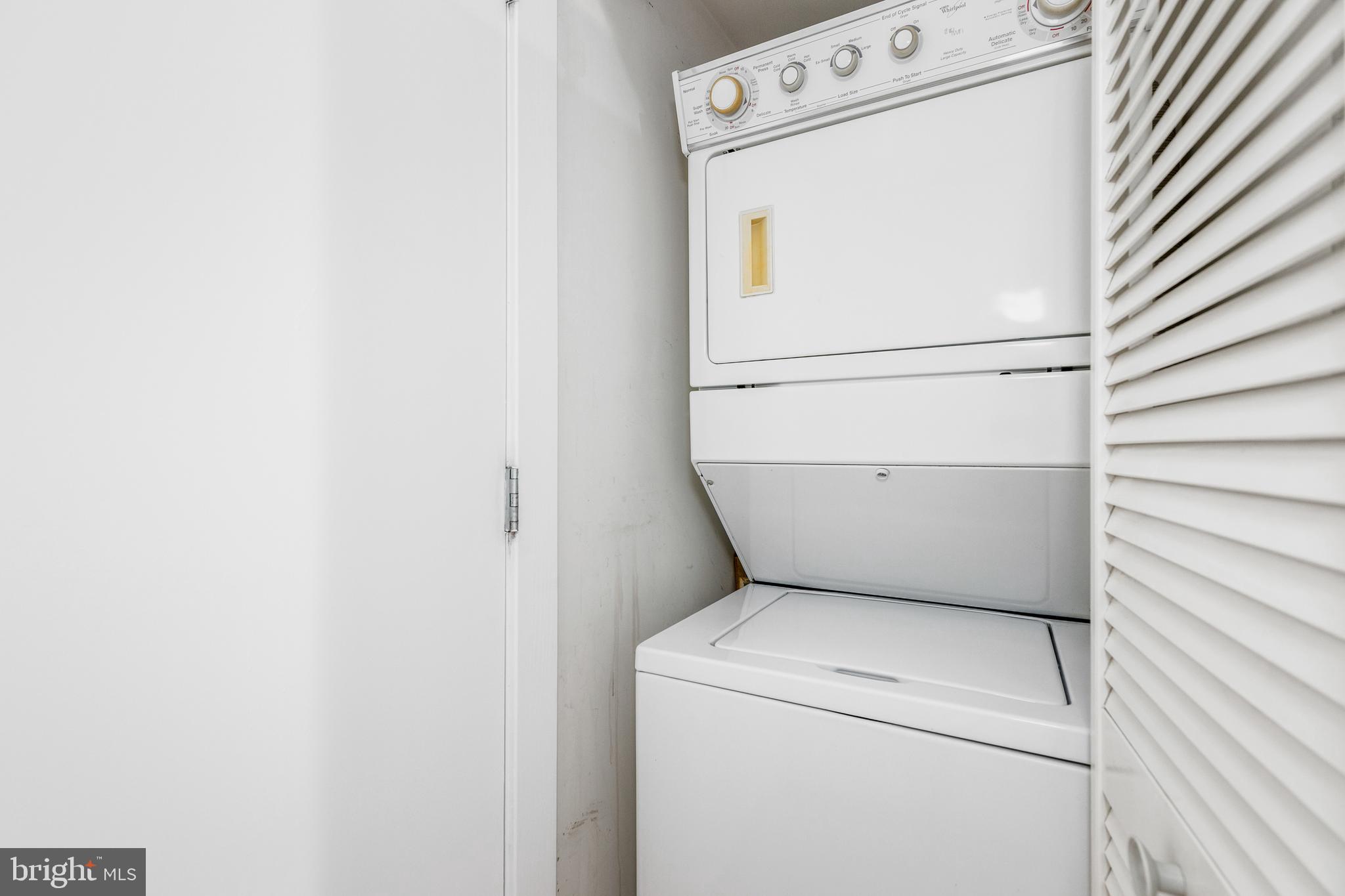1000 New Jersey Avenue Southeast, Unit 608 Washington, DC 20003 - Photo 17 of 28 a utility room with dryer and washer