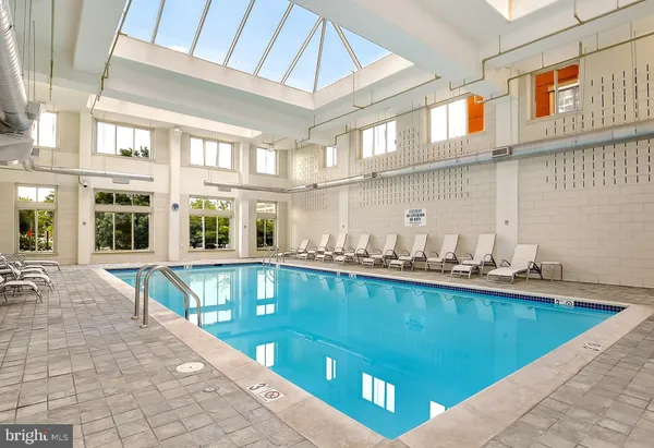 a view of a living room and kitchen