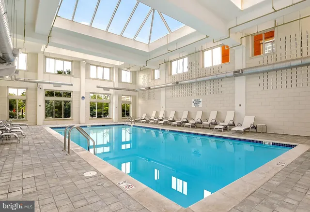 a view of a living room and kitchen
