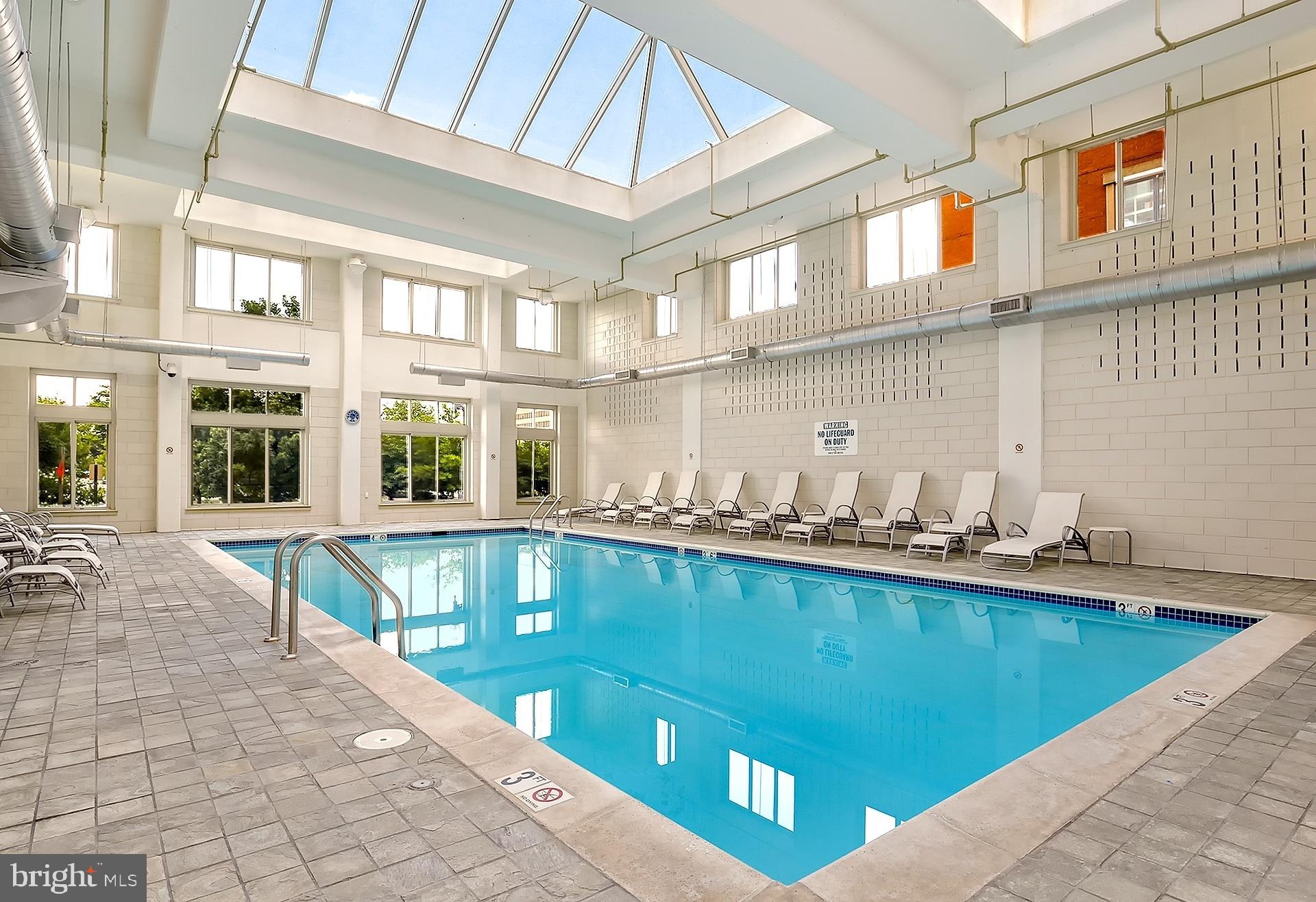 1000 New Jersey Avenue Southeast, Unit 608 Washington, DC 20003 - Photo 23 of 28 a very nice looking kitchen with kitchen island a large window in it