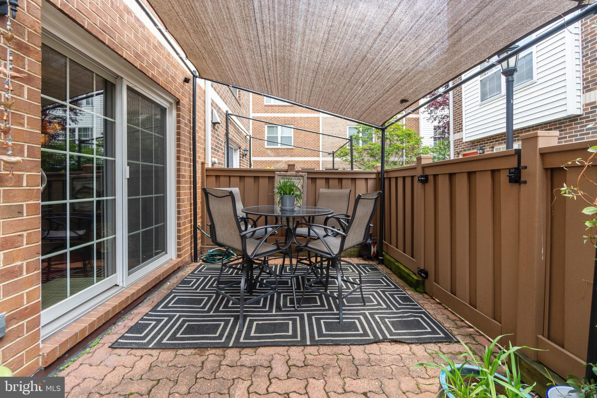 3032 South Glebe Road Arlington, VA 22206 - Photo 26 of 38 Brick Patio with shade cover!