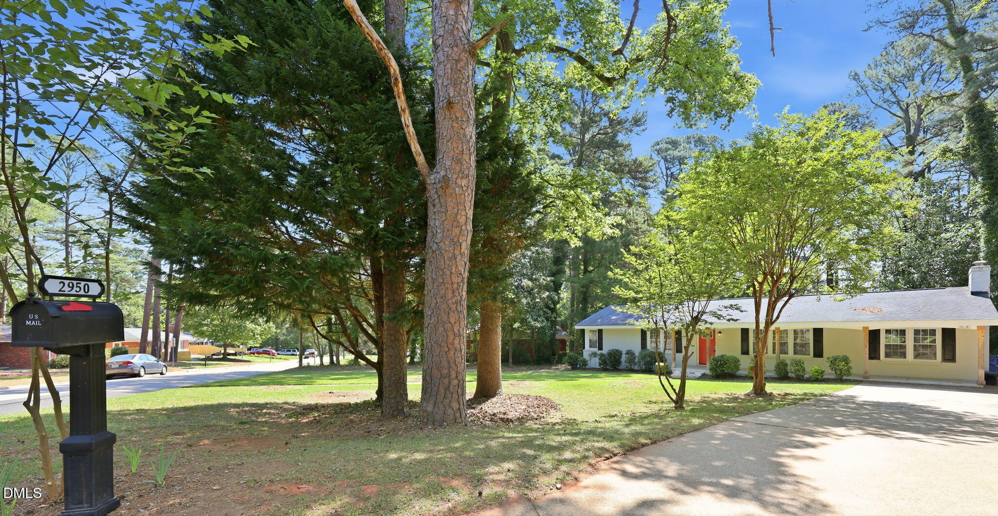 2950 Glenridge Drive Raleigh, NC 27604 - Photo 53 of 53 a view of a trees in front of a house