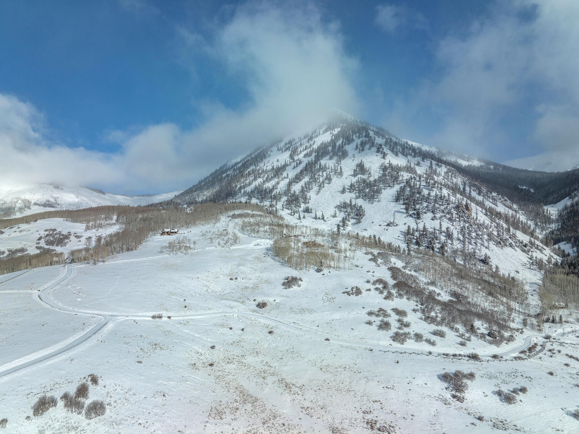 300 Whipple Way Telluride, CO 81435 - Photo 20 of 28 a view of a dry yard with wooden fence