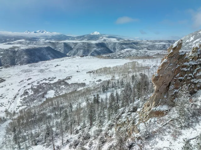 a view of ocean view with wooden fence