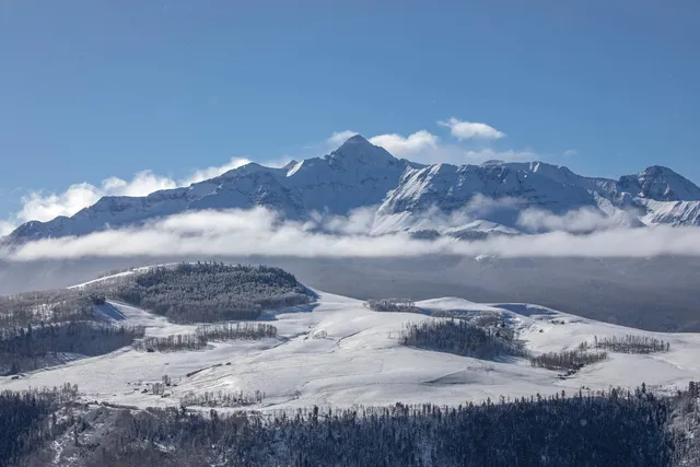 a view of a lake with a mountain