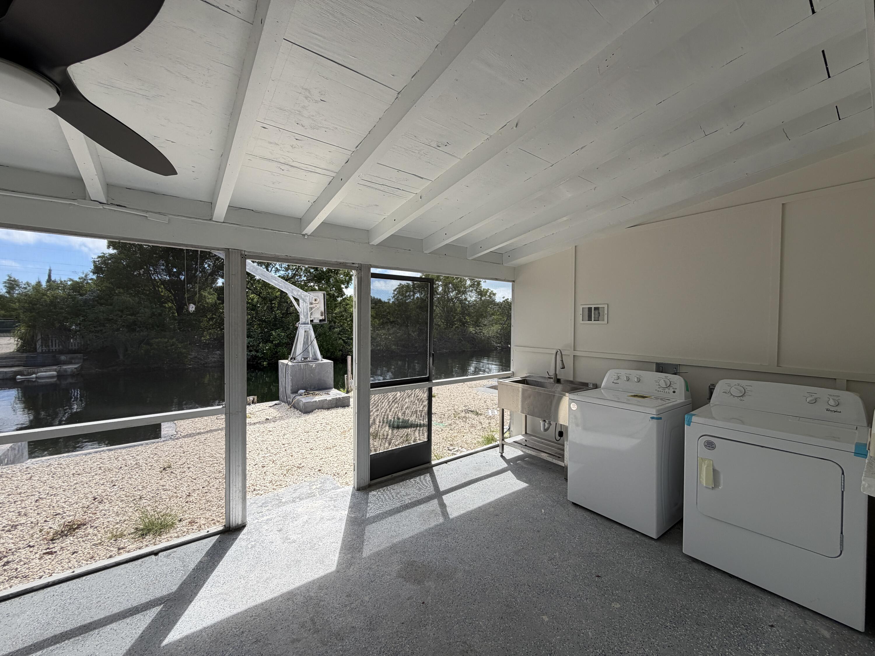 29656 Constitution Avenue Big Pine Key, FL 33043 - Photo 14 of 19 a view of a room with storage and utility
