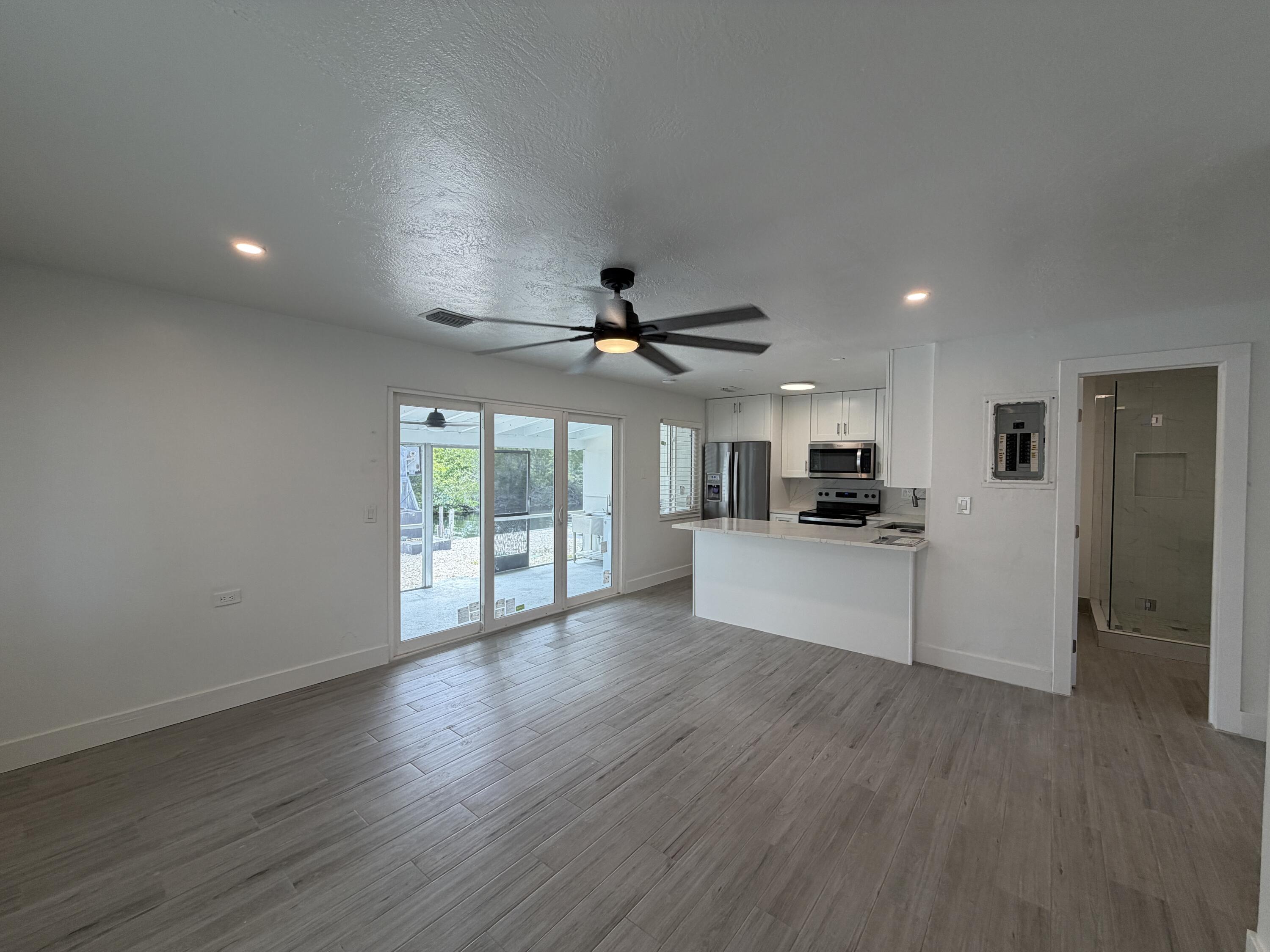 29656 Constitution Avenue Big Pine Key, FL 33043 - Photo 2 of 19 a view of kitchen with refrigerator and window