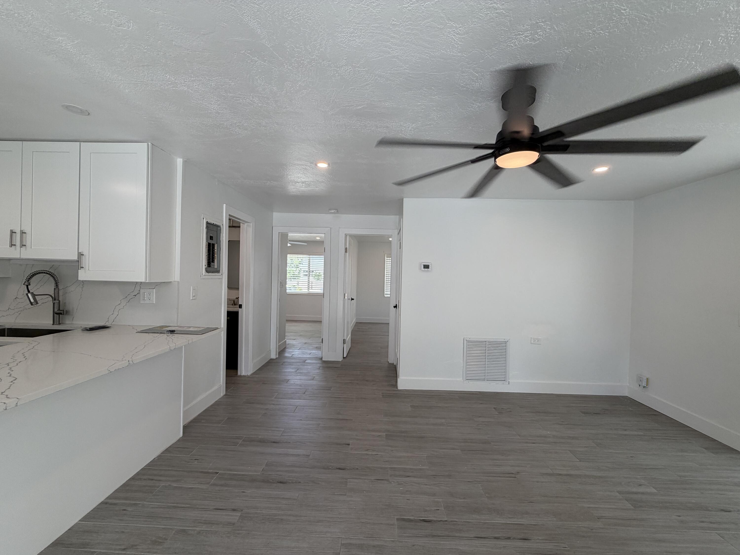 29656 Constitution Avenue Big Pine Key, FL 33043 - Photo 3 of 19 a view of a kitchen with a sink and a refrigerator