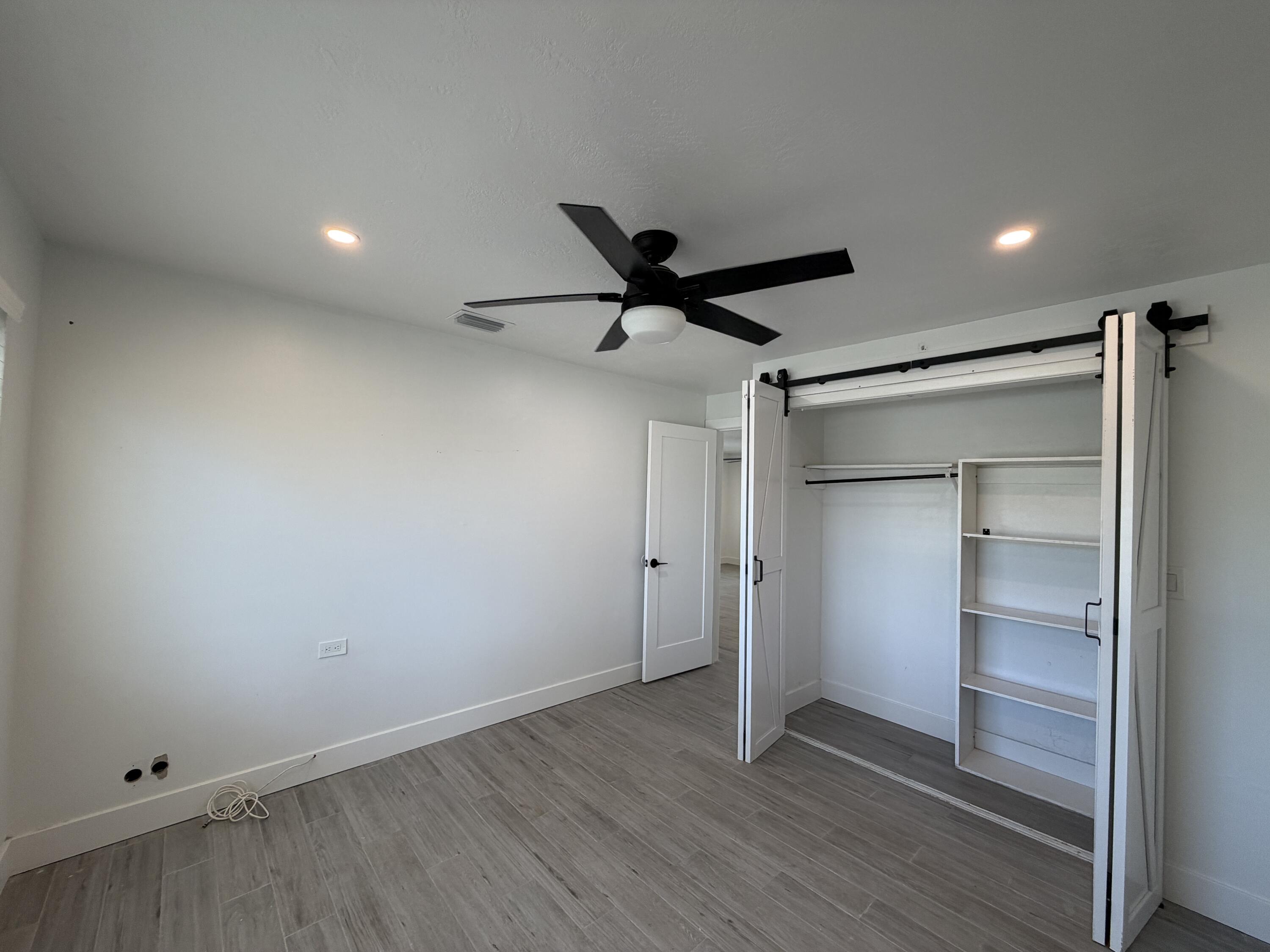 29656 Constitution Avenue Big Pine Key, FL 33043 - Photo 10 of 19 a view of empty room with wooden floor