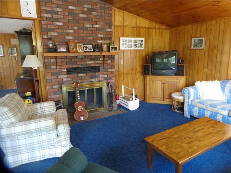 74 Deer Acres Road Raymond, ME 04071 - Photo 5 of 35 Living Room. Wood burning fireplace