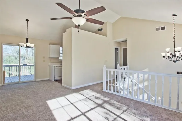 a view of a livingroom with furniture