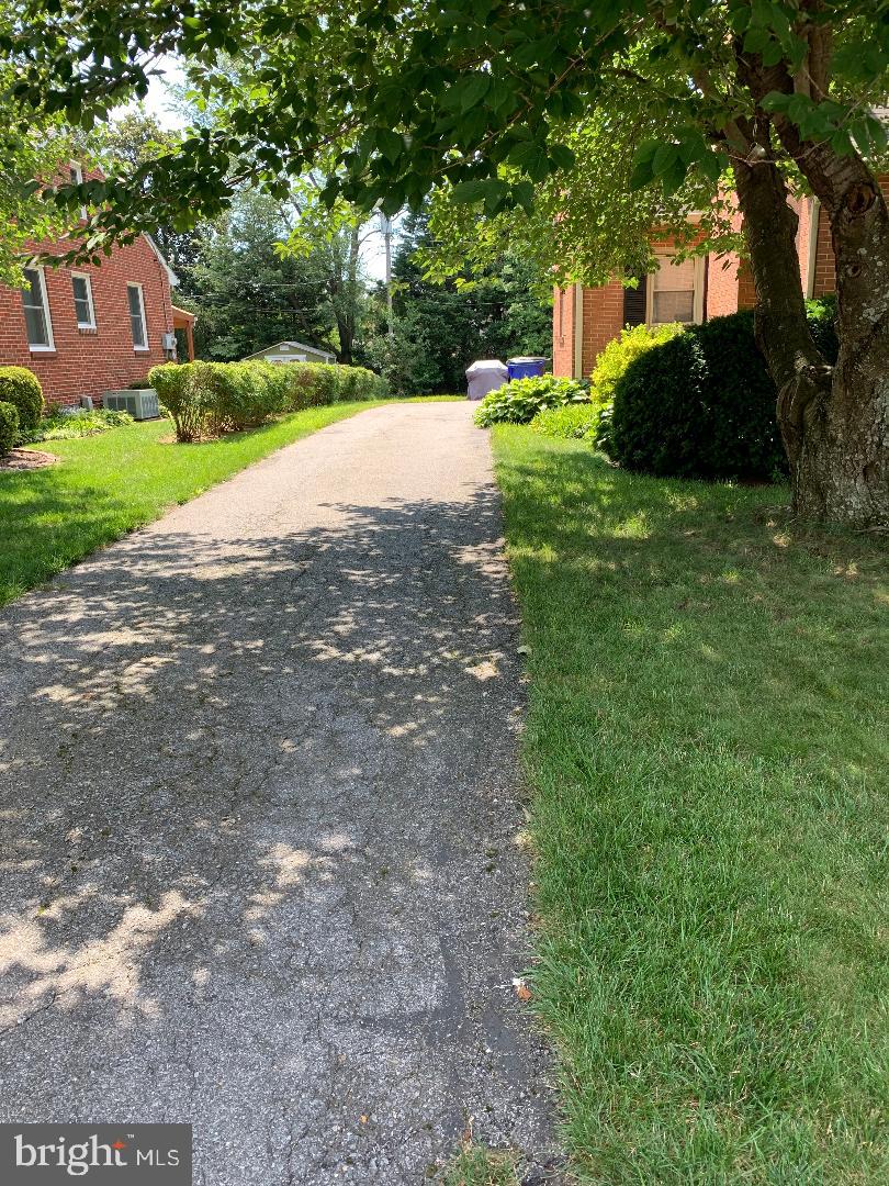 112 Fairview Avenue Frederick, MD 21701 - Photo 12 of 24 a view of a house with a yard and a street