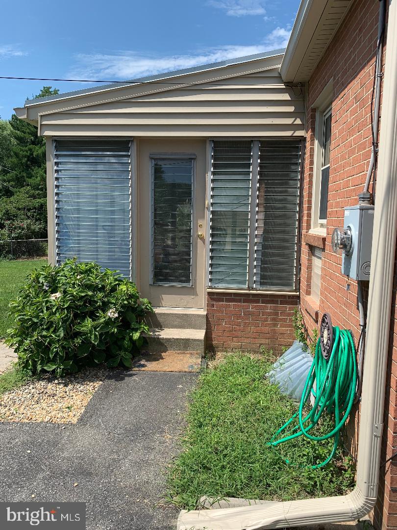 112 Fairview Avenue Frederick, MD 21701 - Photo 14 of 24 a front view of a house with garden
