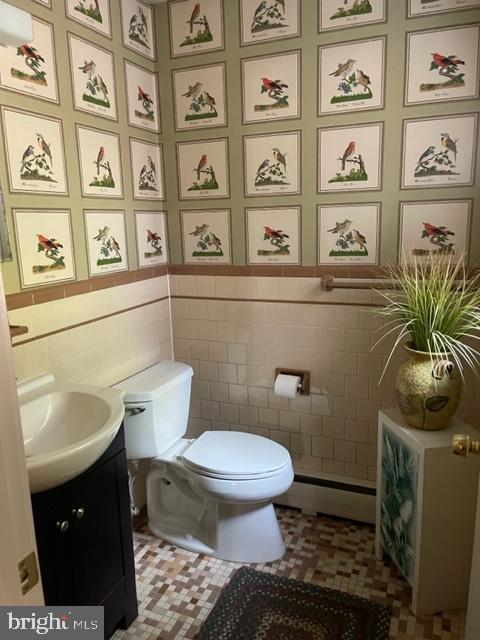 112 Fairview Avenue Frederick, MD 21701 - Photo 23 of 24 a bathroom with a toilet and a sink