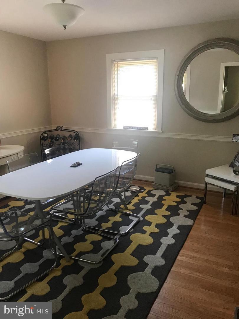 112 Fairview Avenue Frederick, MD 21701 - Photo 8 of 24 a bathroom with a sink and a mirror