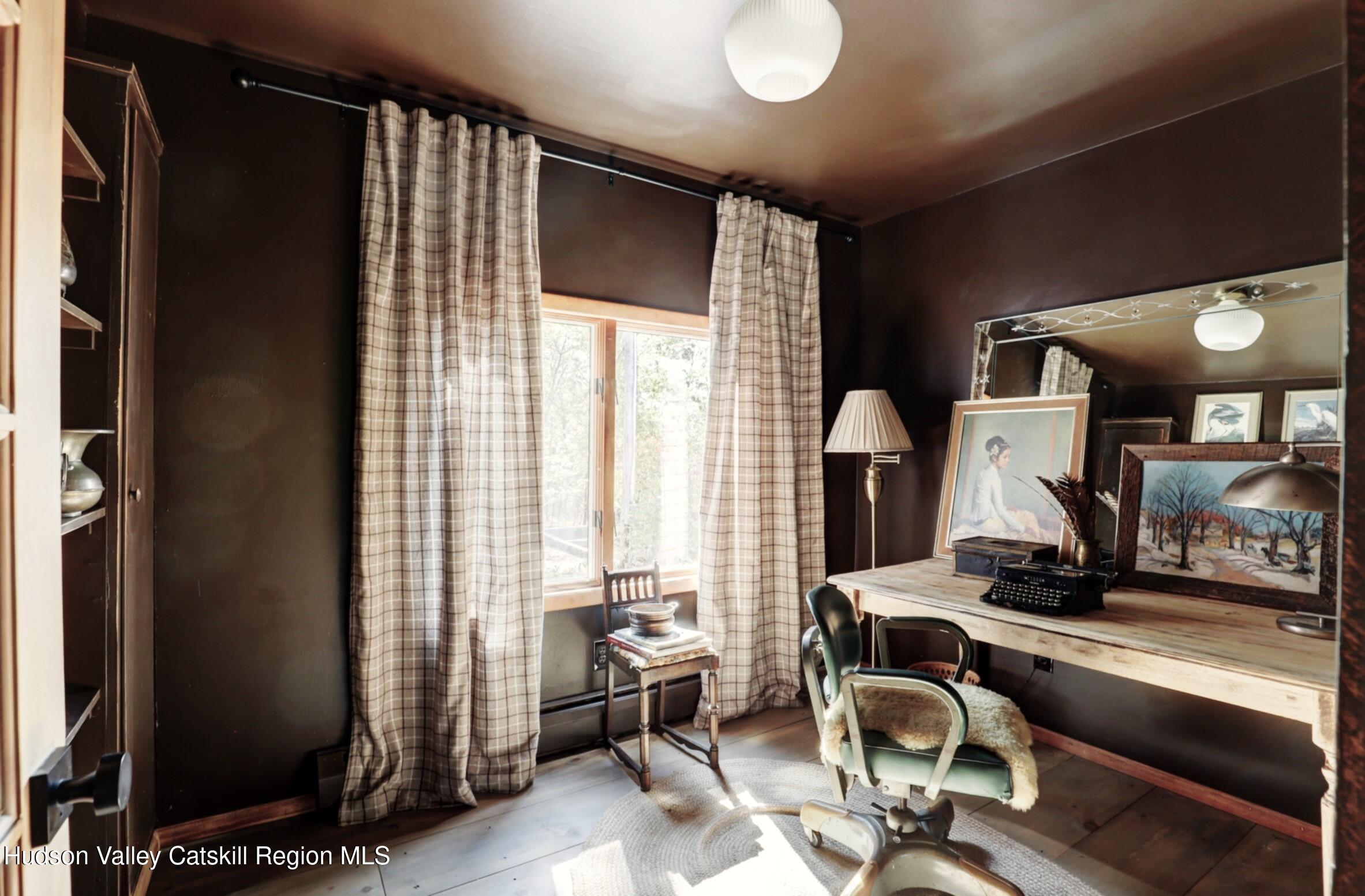 96 Echo Hill Road Saugerties, NY 12477 - Photo 20 of 32 a room with lots of chairs and mirrors