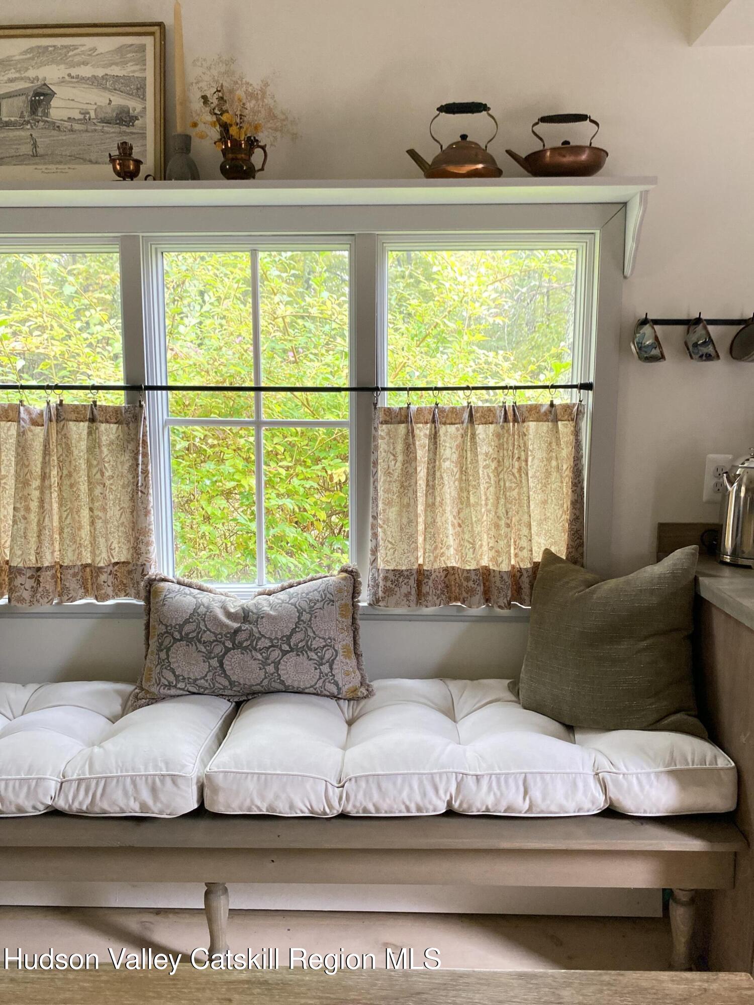 96 Echo Hill Road Saugerties, NY 12477 - Photo 8 of 32 a living room with furniture and a large window