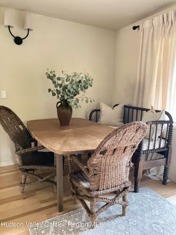 a bedroom with a bed and a table