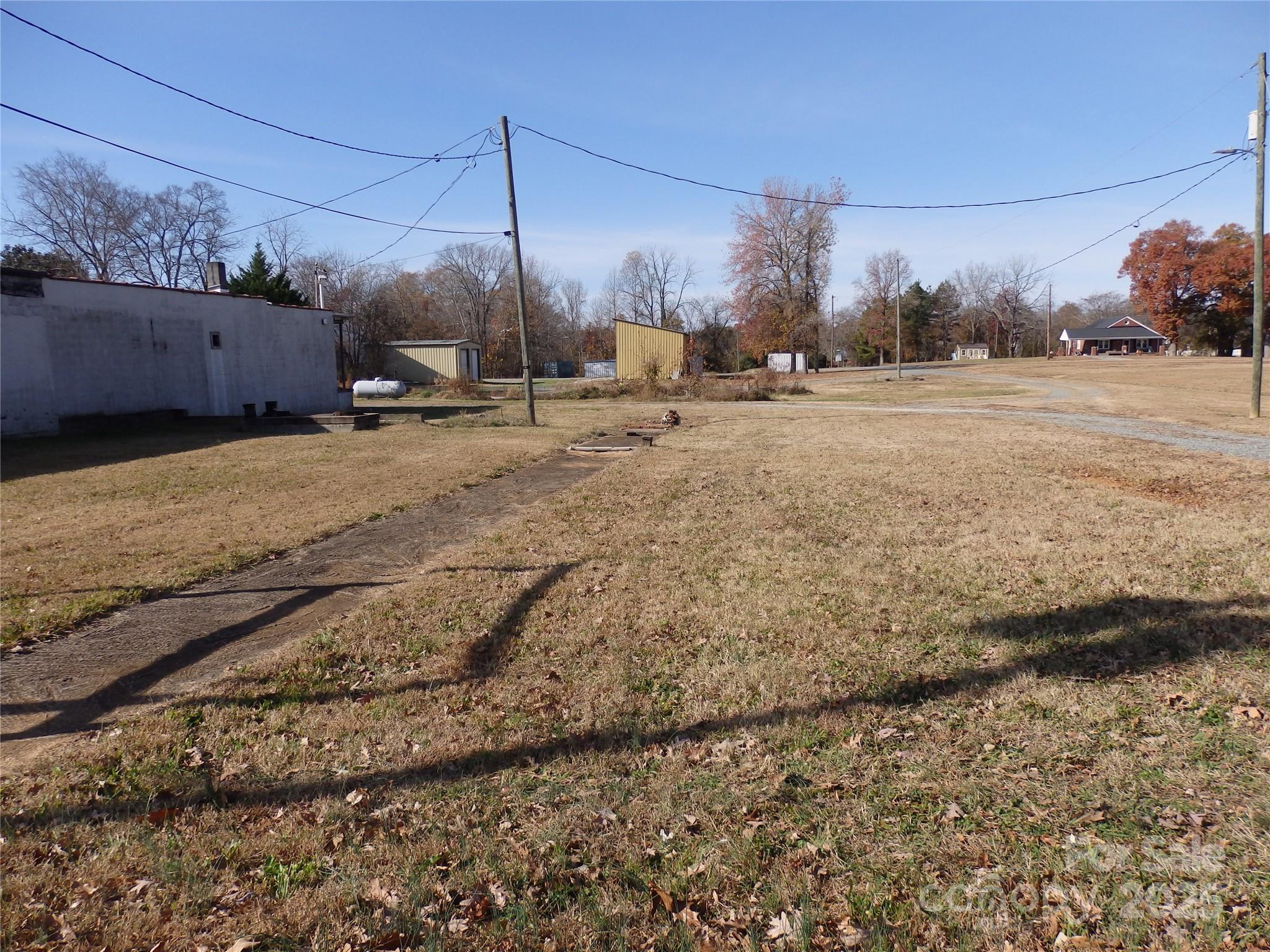 166 South Main Street Denton, NC 27239 - Photo 3 of 5 a view of a backyard