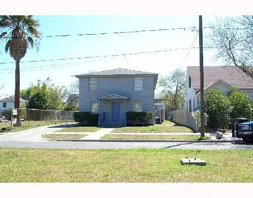a swimming pool view with a outdoor seating