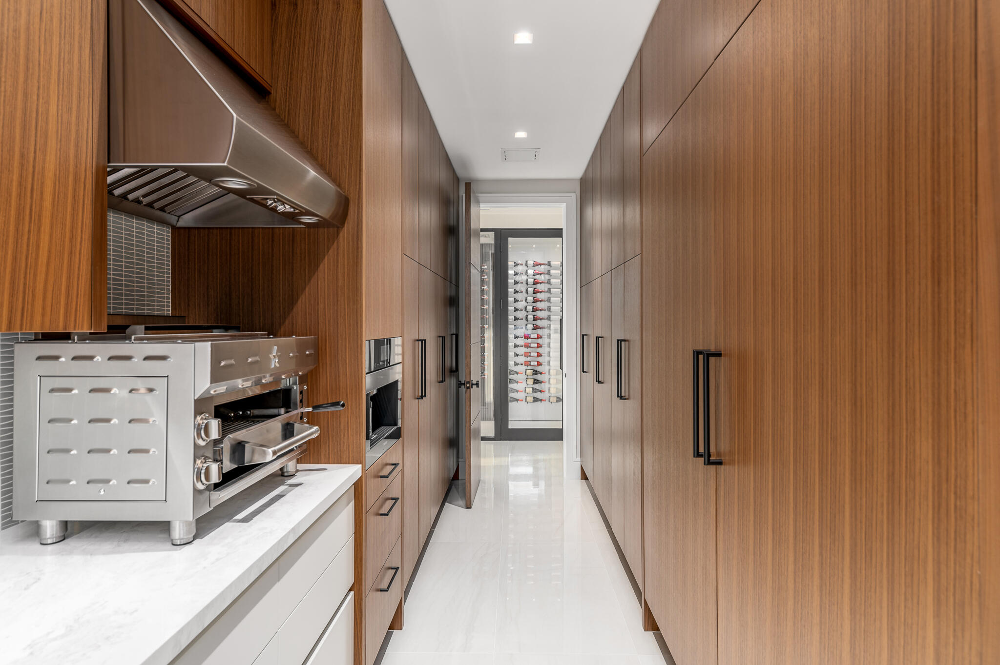 488 South Beach Road Jupiter Island, FL 33455 - Photo 18 of 54 a view of a hallway with storage