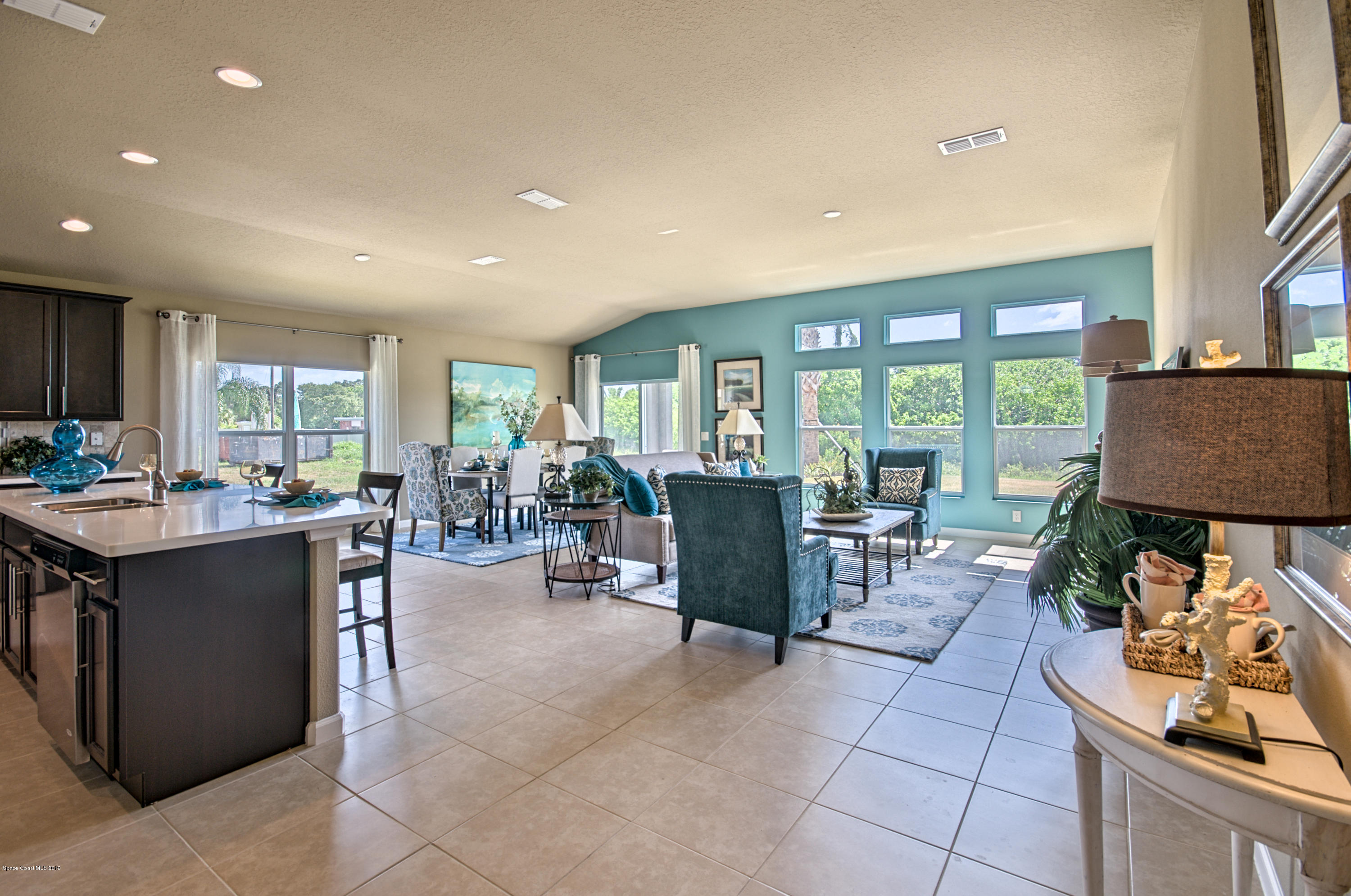1027 Corbin Circle Southwest Palm Bay, FL 32908 - Photo 4 of 11 a kitchen with lots of counter top space