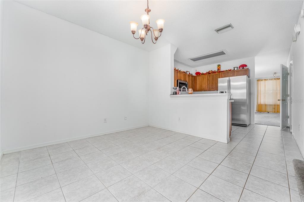 10423 Heron Lake Drive Riverview, FL 33578 - Photo 12 of 30 a view of kitchen with refrigerator and cabinets