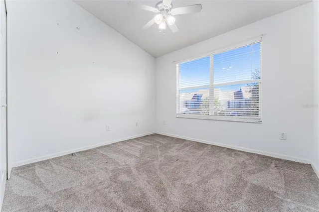 an empty room with a bathroom