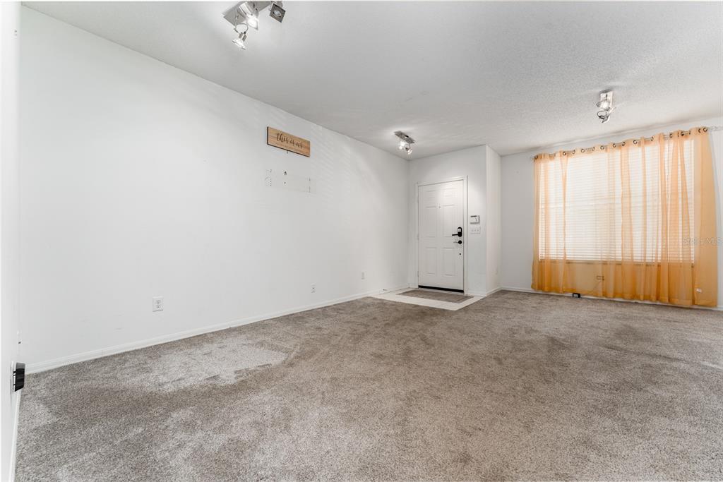 10423 Heron Lake Drive Riverview, FL 33578 - Photo 7 of 30 an empty room with windows
