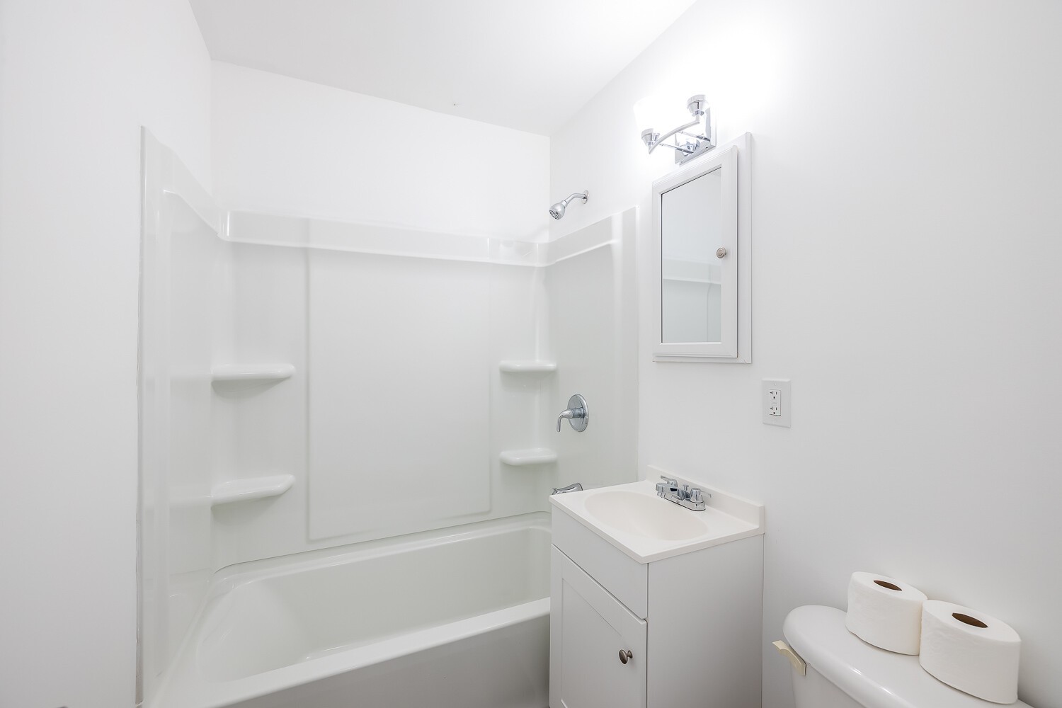 303 Burch Road Clarksville, TN 37042 - Photo 18 of 23 a bathroom with a bathtub sink vanity and toilet