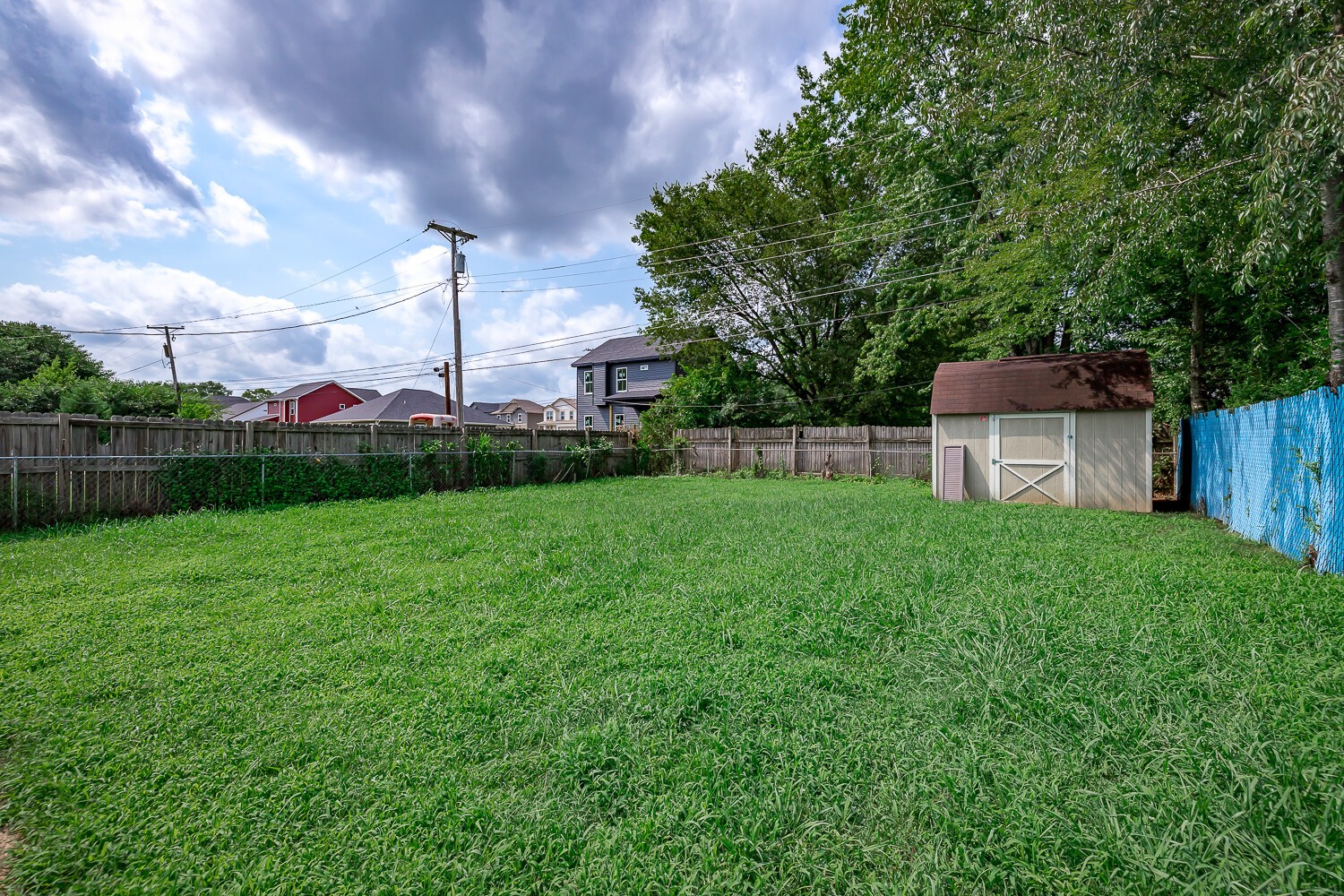 303 Burch Road Clarksville, TN 37042 - Photo 22 of 23 a backyard of a house with lots of green space