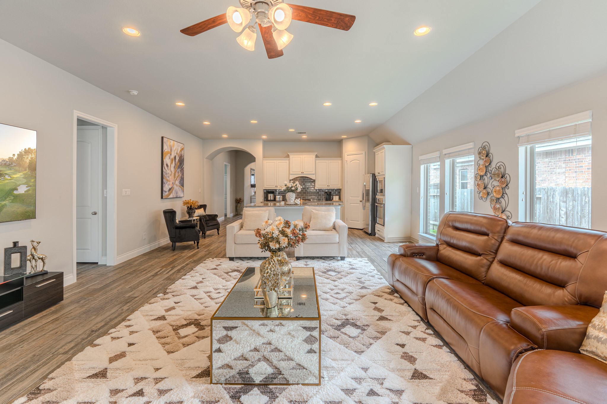 209 Trillium Park Loop Conroe, TX 77304 - Photo 21 of 50 a living room with furniture and a large window