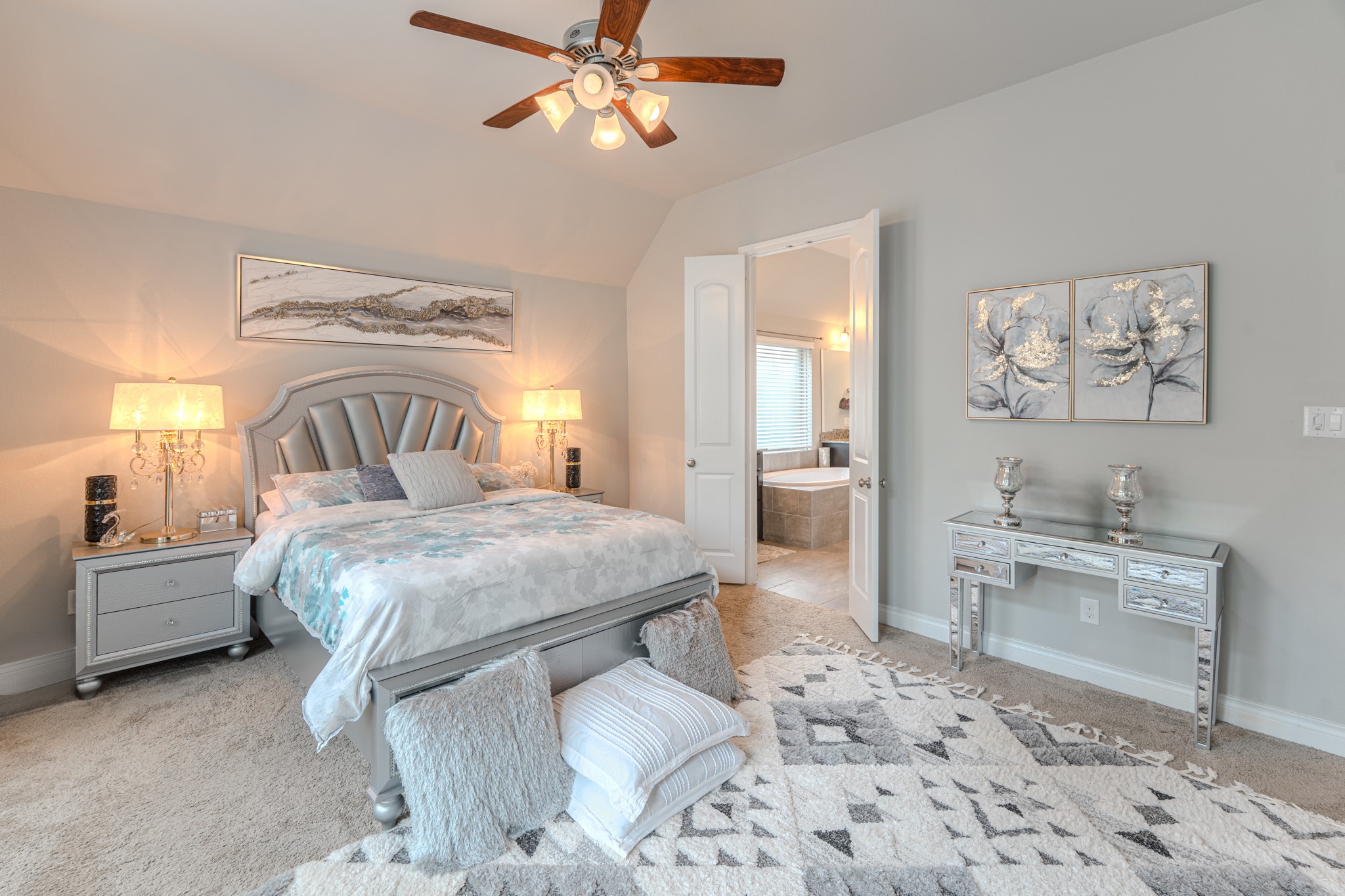 209 Trillium Park Loop Conroe, TX 77304 - Photo 26 of 50 a bedroom with a bed and a view of bathroom