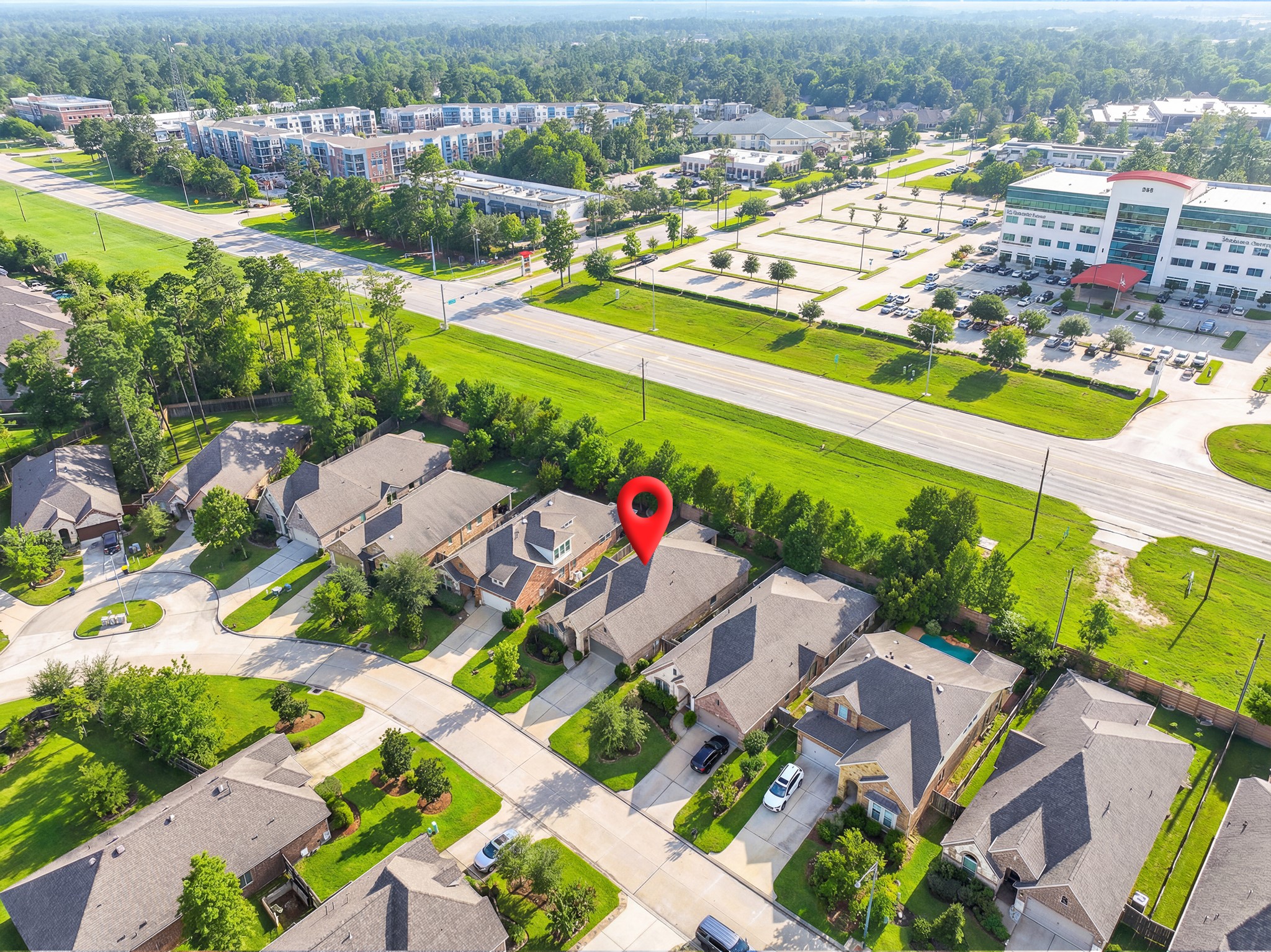 209 Trillium Park Loop Conroe, TX 77304 - Photo 5 of 50 an aerial view of residential houses with outdoor space and river