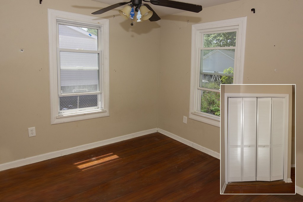 38-40 Beauregard Street Springfield, MA 01151 - Photo 5 of 30 a view of an empty room with wooden floor and a window