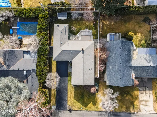 an aerial view of a house with a lake view