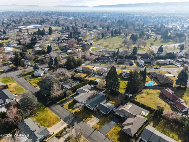 an aerial view of a city with lots of residential buildings