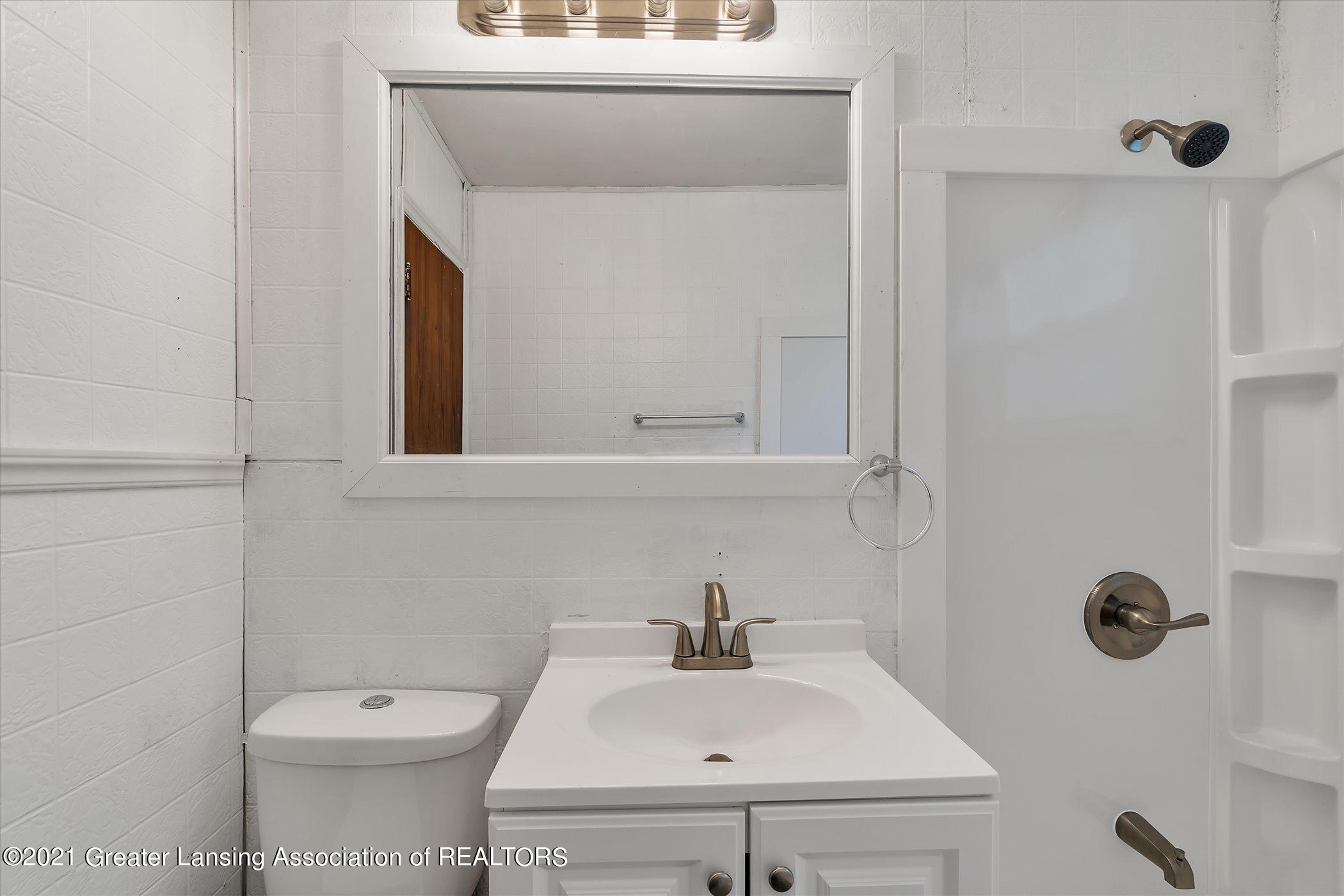 6532 Sommerset Road Lansing, MI 48911 - Photo 22 of 37 22-6532-Sommerset-Rd-WindowStill-Real-Es