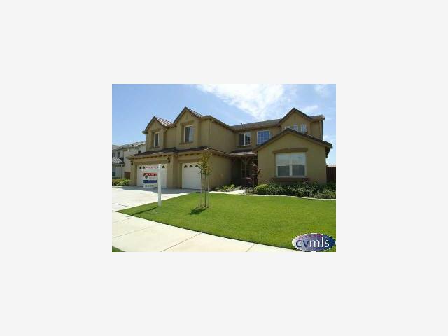 626 Lan Way Ripon, CA 95366 - Photo 1 of 12 a picture of a person on a street