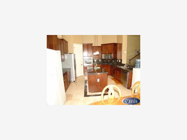 626 Lan Way Ripon, CA 95366 - Photo 8 of 12 a view of a living room with a table and chairs