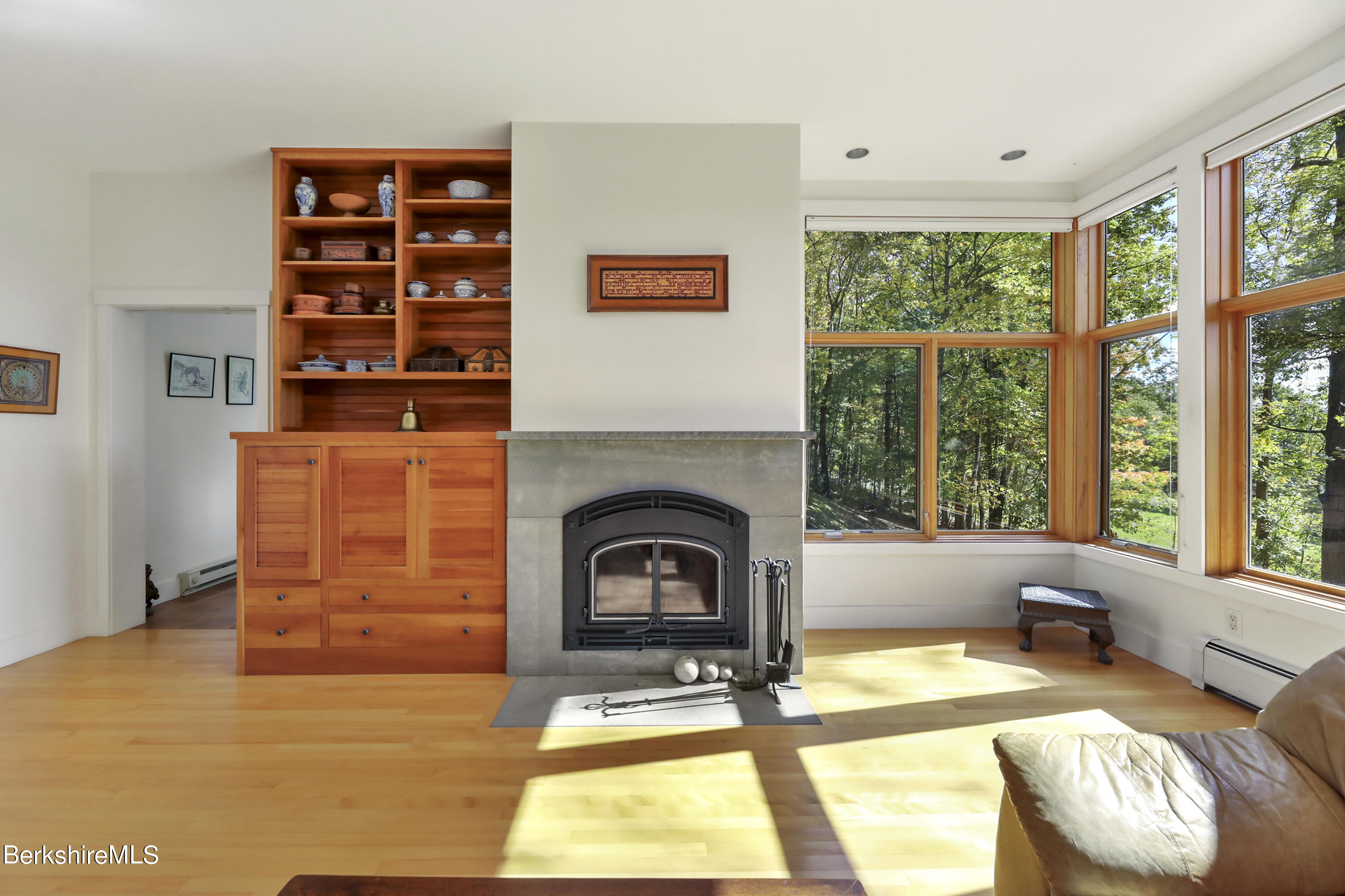 494 Dean Hill Road Richmond, MA 01254 - Photo 13 of 54 a living room with furniture and a fireplace