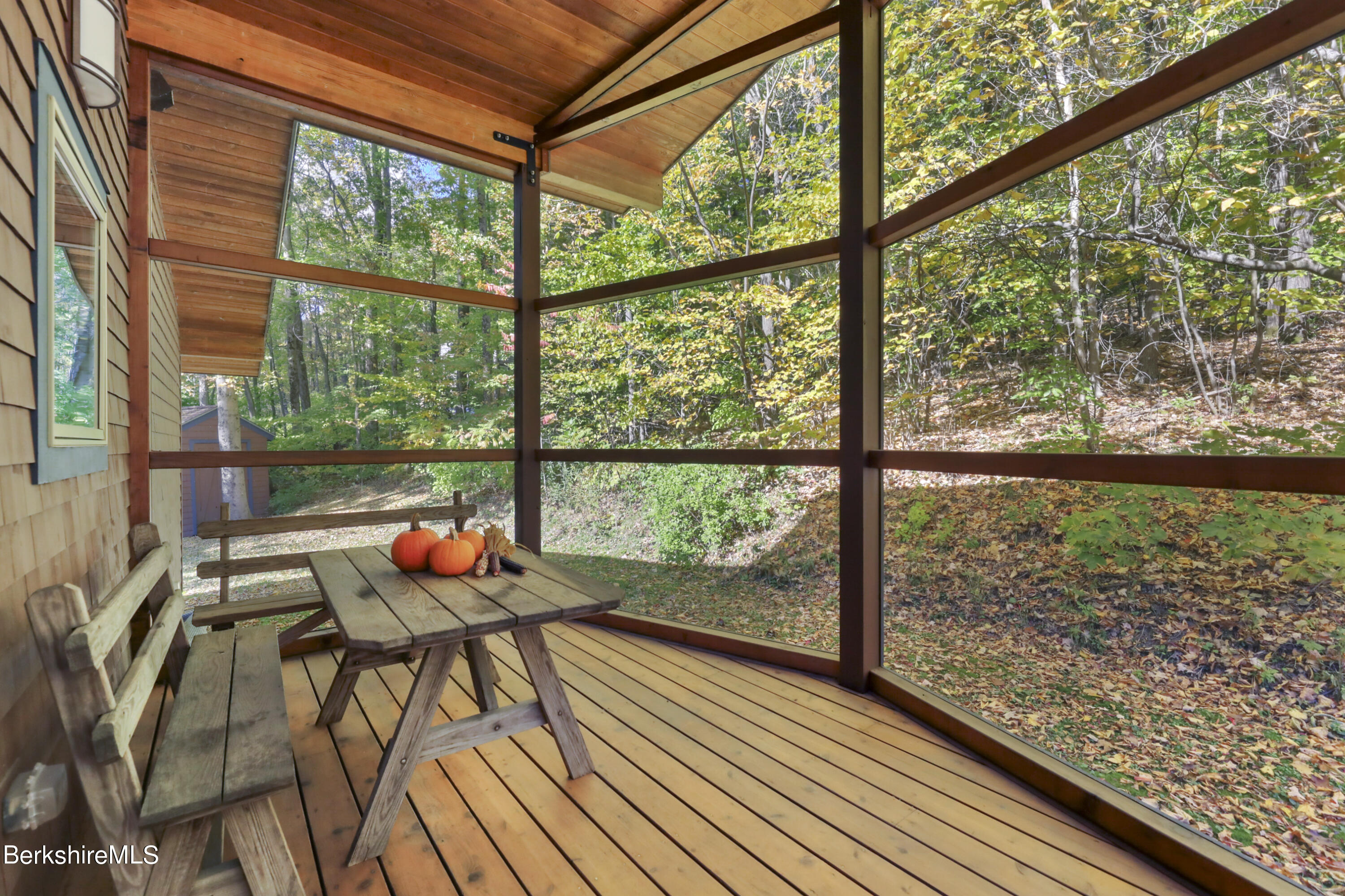 494 Dean Hill Road Richmond, MA 01254 - Photo 23 of 54 a view of a room with wooden floor and windows