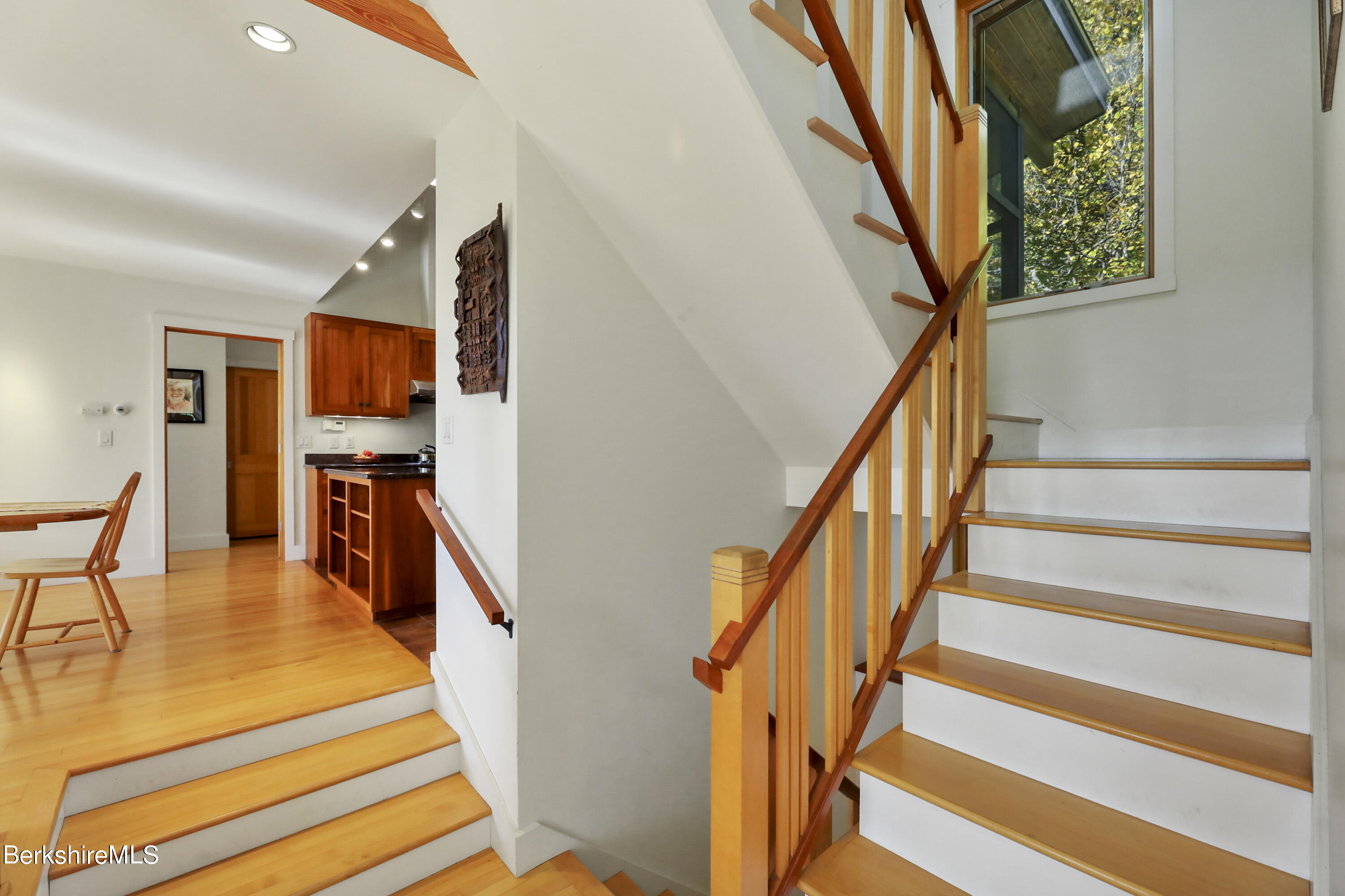 494 Dean Hill Road Richmond, MA 01254 - Photo 30 of 54 a hallway with wooden floor and furniture